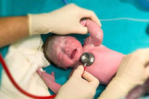 newborn baby being monitored